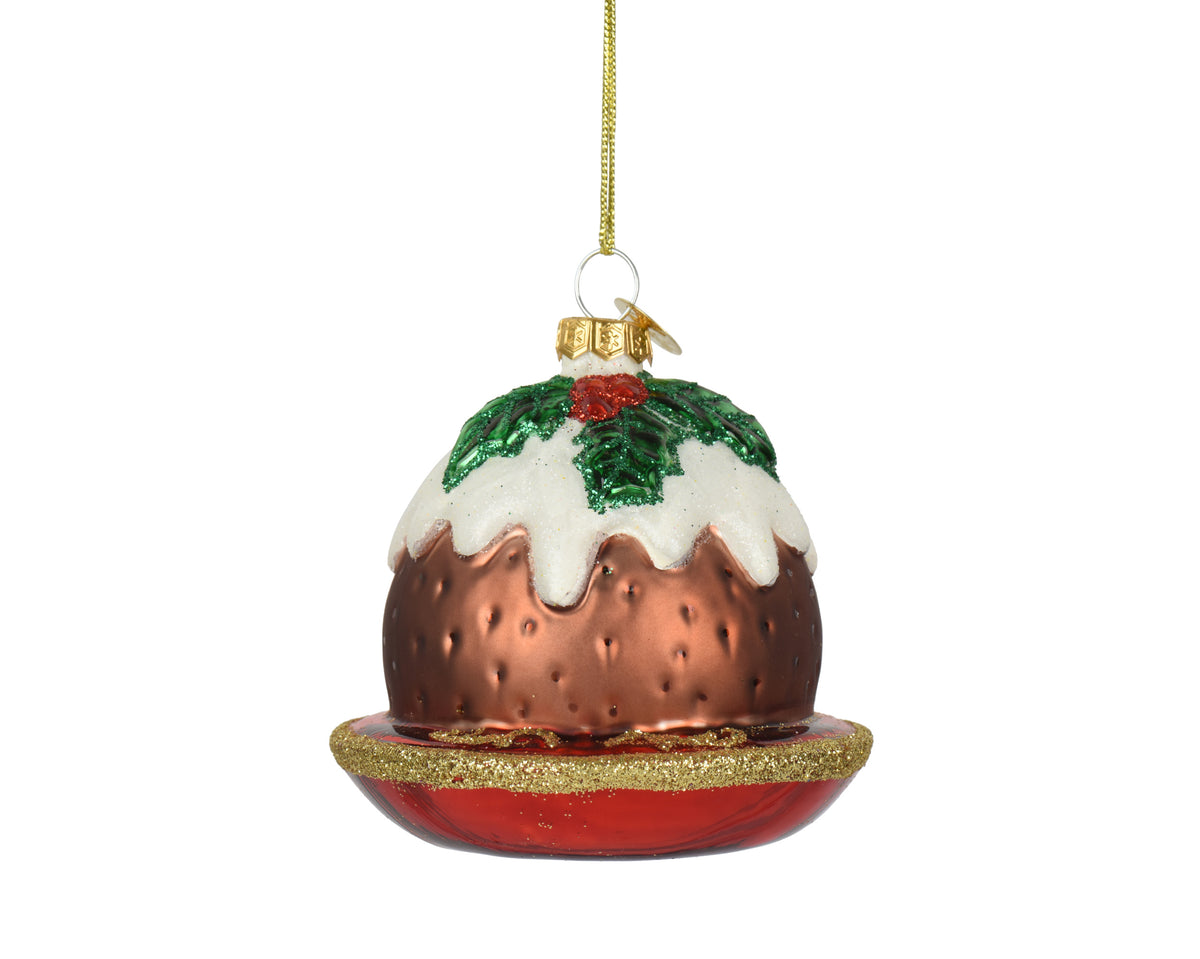Christmas ornament shaped like a pudding with a gold ribbon on a white background